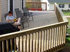 The new deck extends from the side around to the back (175 KB)